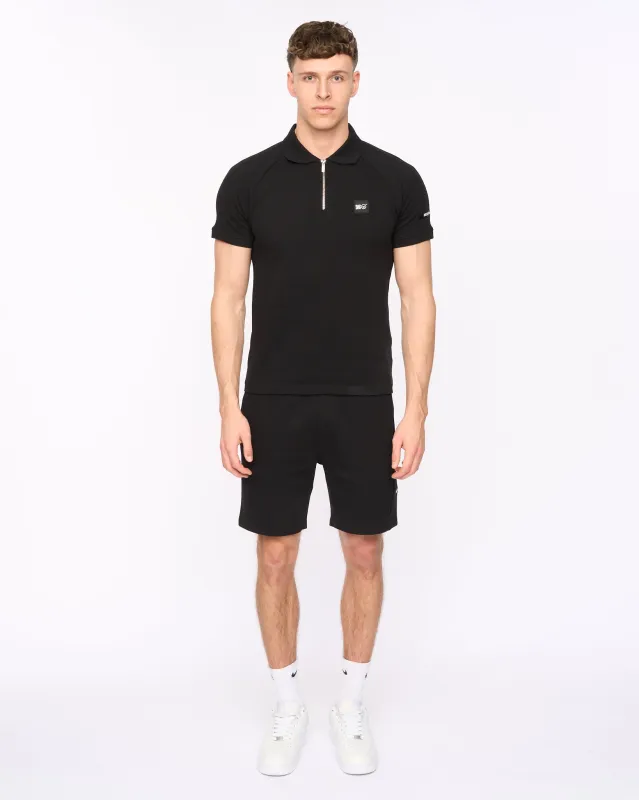 Topfield Polo & Short Black made by Duck and Cover