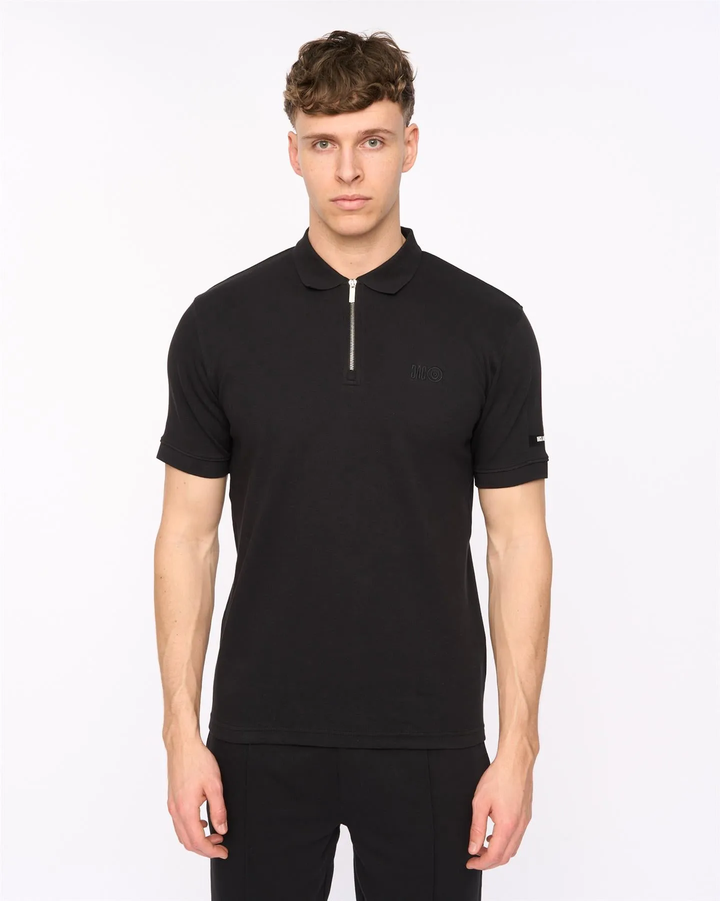 Sherborn Polo Black sold by Duck and Cover