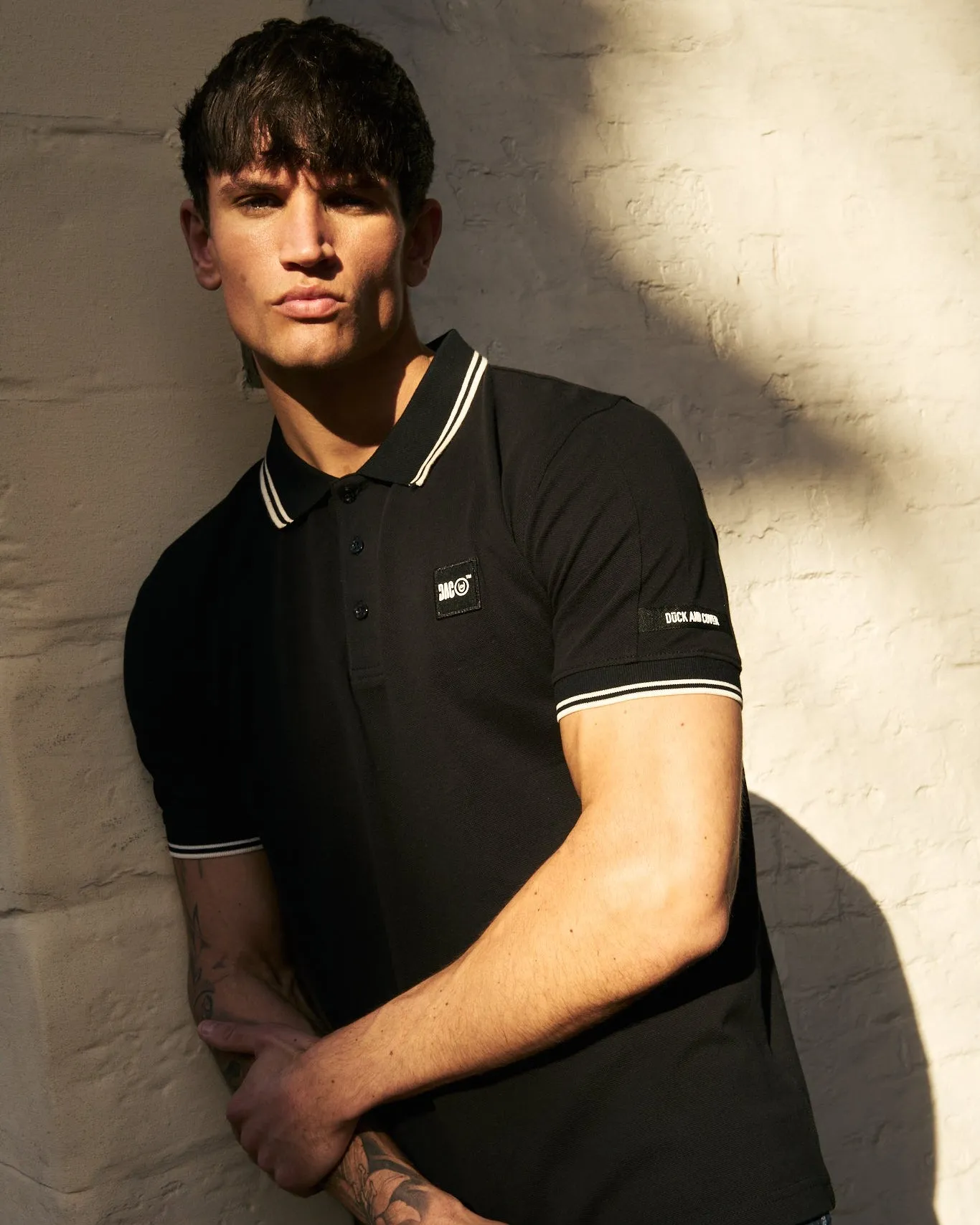 Wrentham Polo Black sold by Duck and Cover