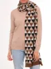 BRIDGE & LORD TRIANGLE SCARF sold by ENNI