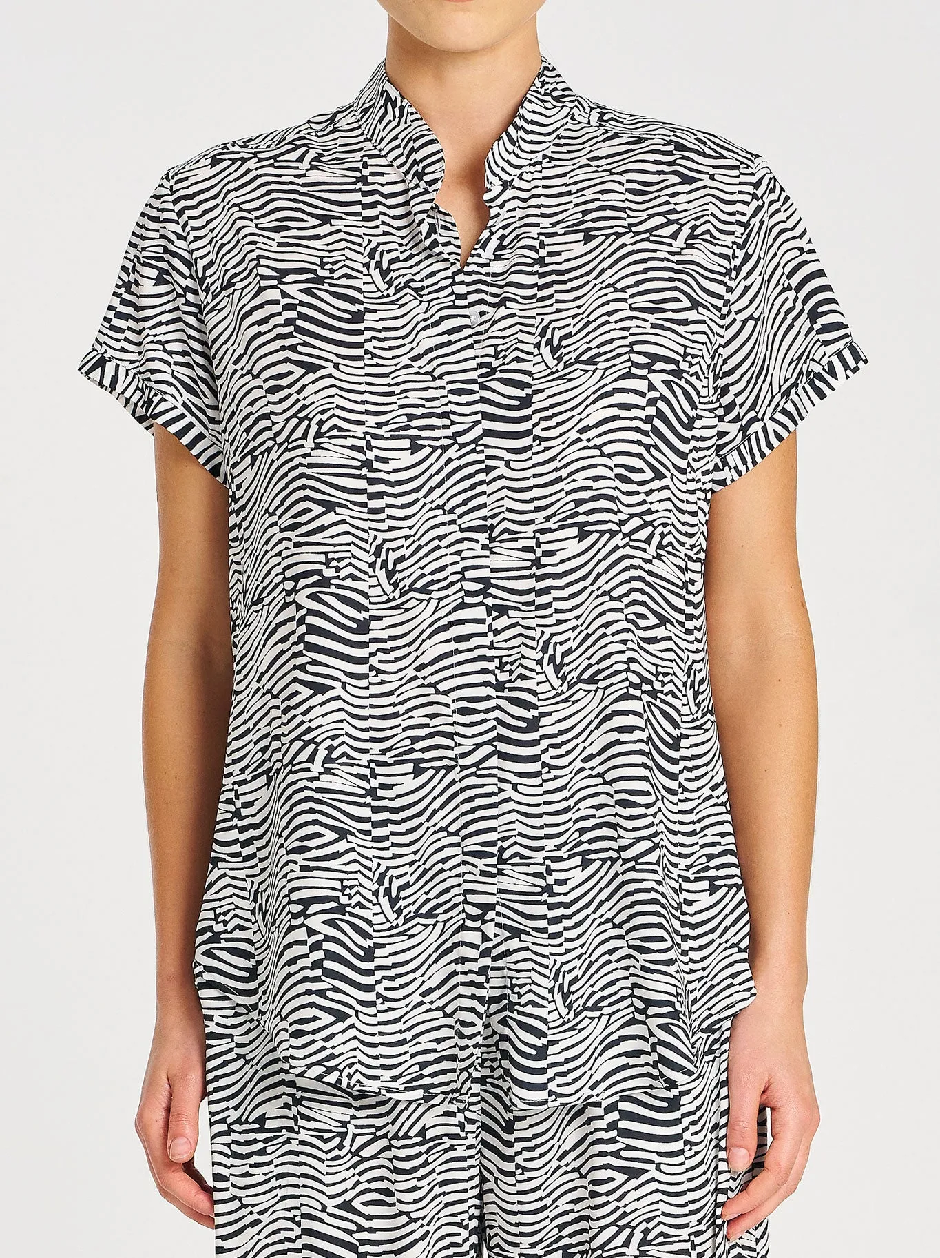 MELA PURDIE SOFT STAND SHIRT sold by ENNI