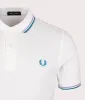 The Twin Tipped Fred Perry Polo Shirt sold by EQVVS