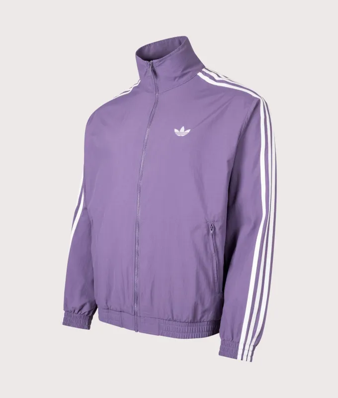 Loose Fit Firebird Woven Track Top sold by EQVVS