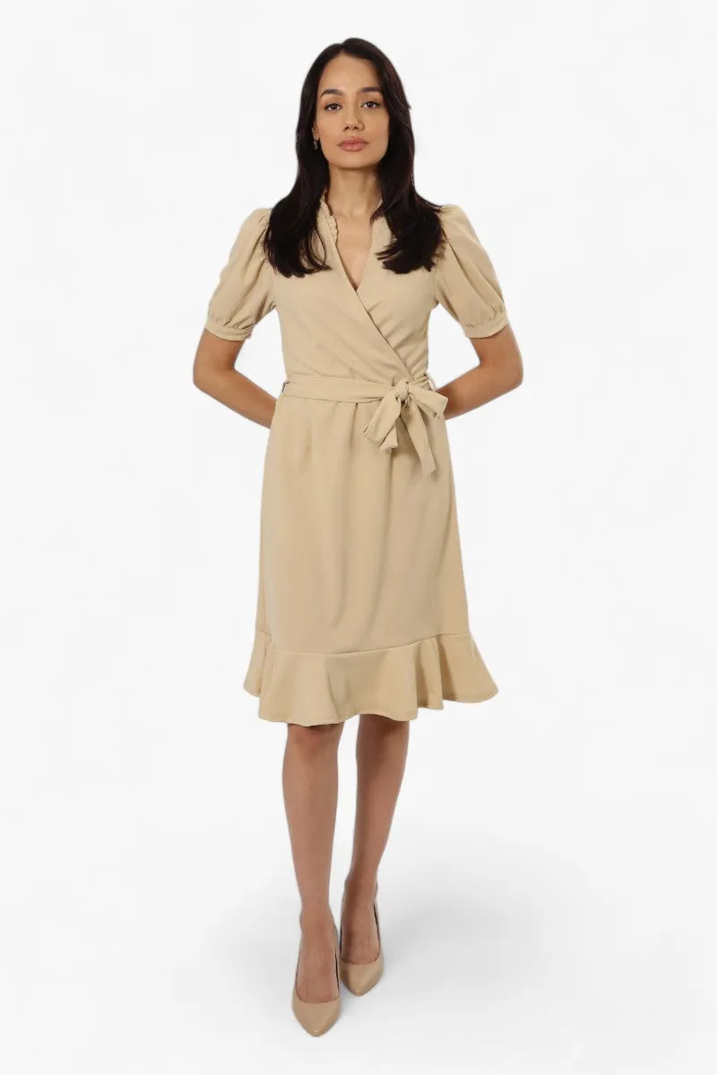 Limite Belted Crossover Day Dress - Beige sold by Fairweather