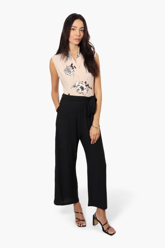 Limite Floral Belted Crossover Jumpsuit - Pink sold by Fairweather