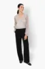 Limite Sheer Sleeve Lurex Blouse - Grey sold by Fairweather
