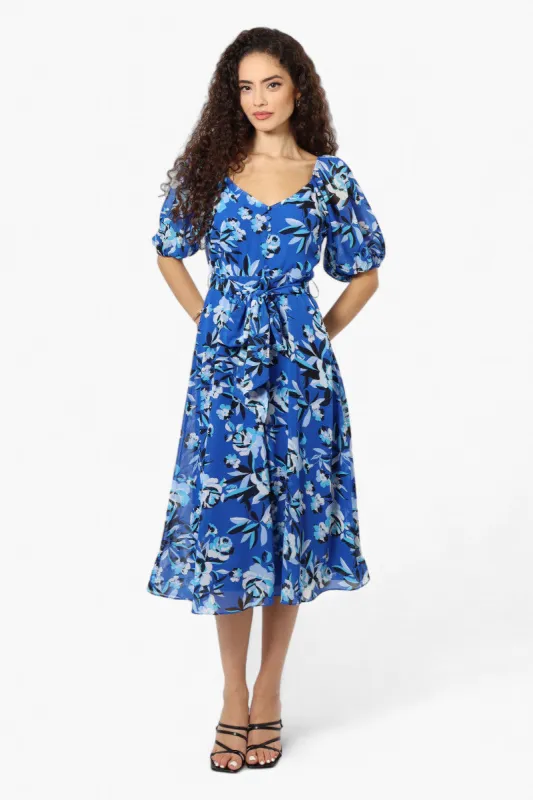 Limite Floral Puff Sleeve Belted Midi Dress - Blue sold by Fairweather