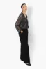 Limite Sheer Sleeve Lurex Blouse - Black sold by Fairweather