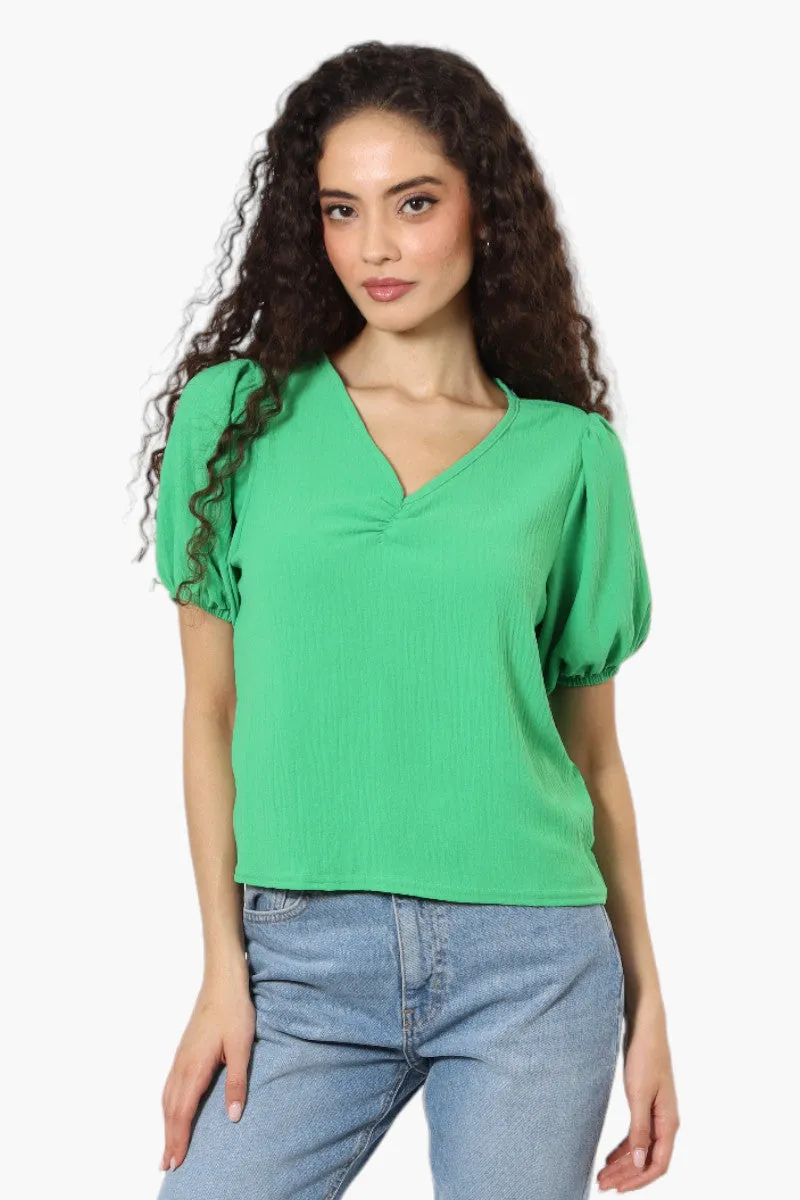 Magazine V-Neck Bell Sleeve Blouse - Green sold by Fairweather