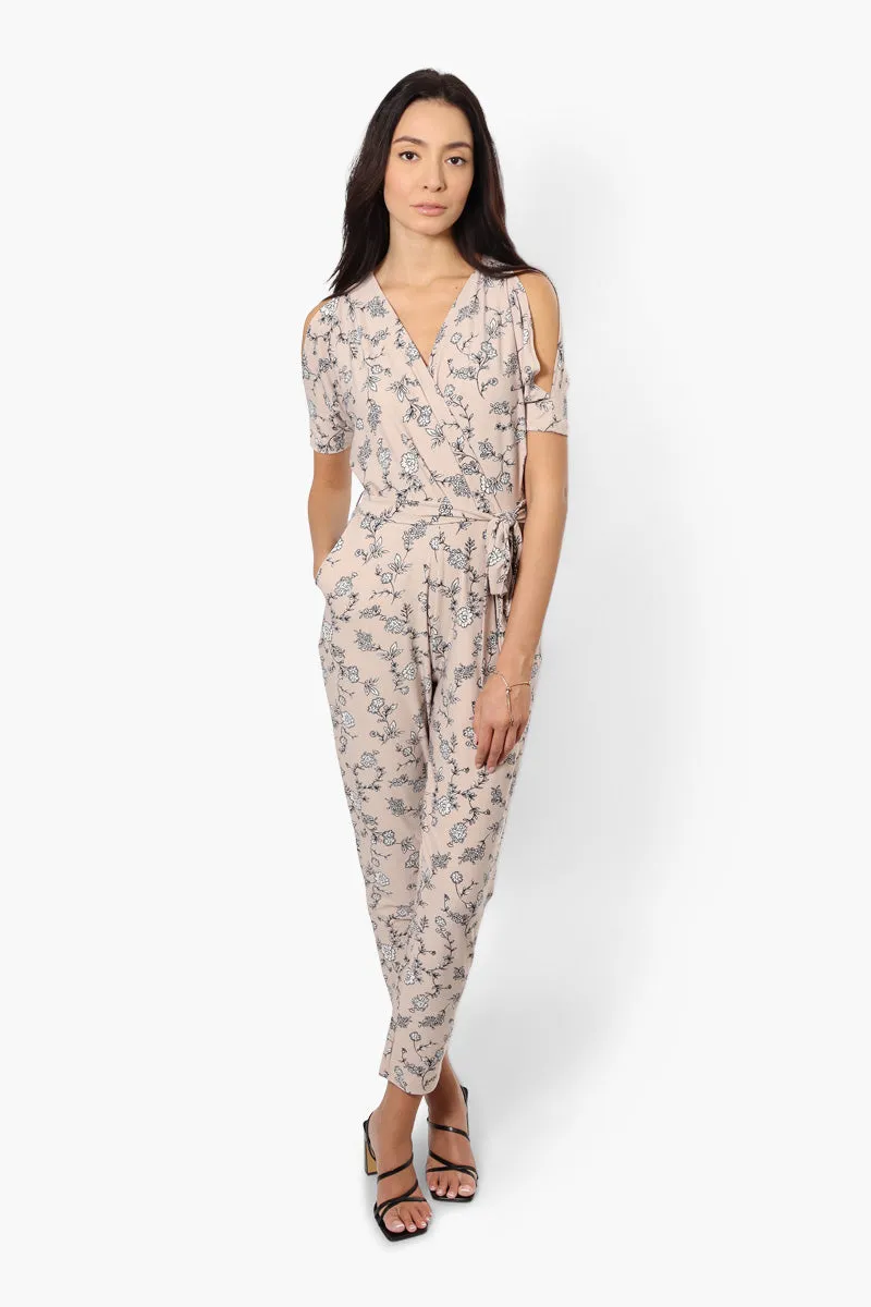 Limite Floral Cold Shoulder Belted Jumpsuit - Beige sold by Fairweather