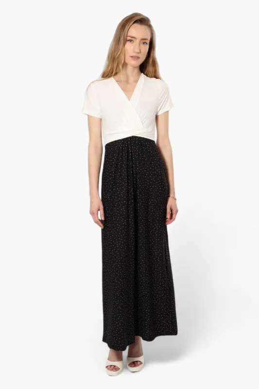 Limite Dotted Crossover Maxi Dress - Black sold by Fairweather