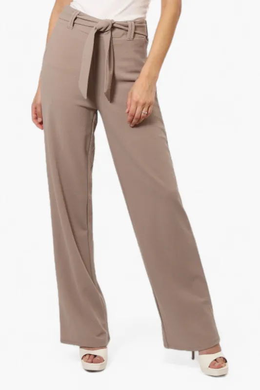Limite Solid Belted Pants - Beige sold by Fairweather