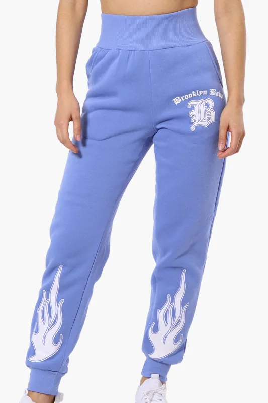New Look High Waisted Flame Print Joggers - Blue sold by Fairweather