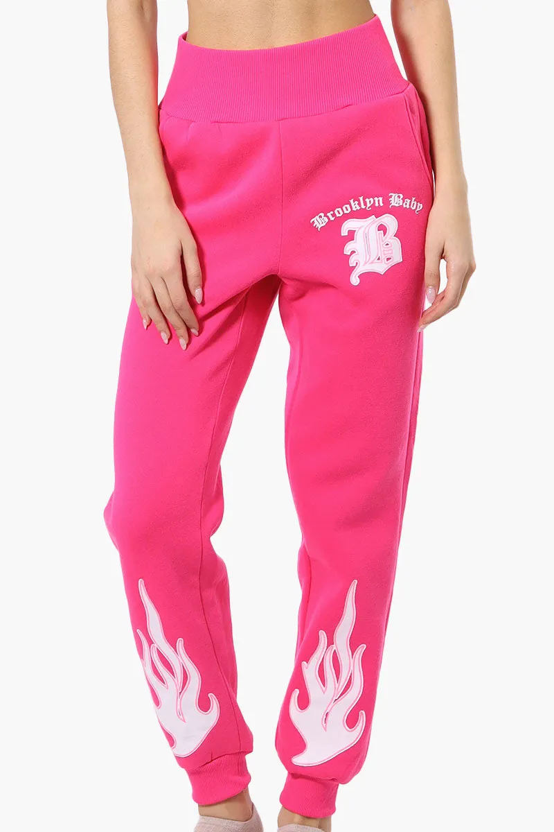 New Look High Waisted Flame Print Joggers - Pink sold by Fairweather