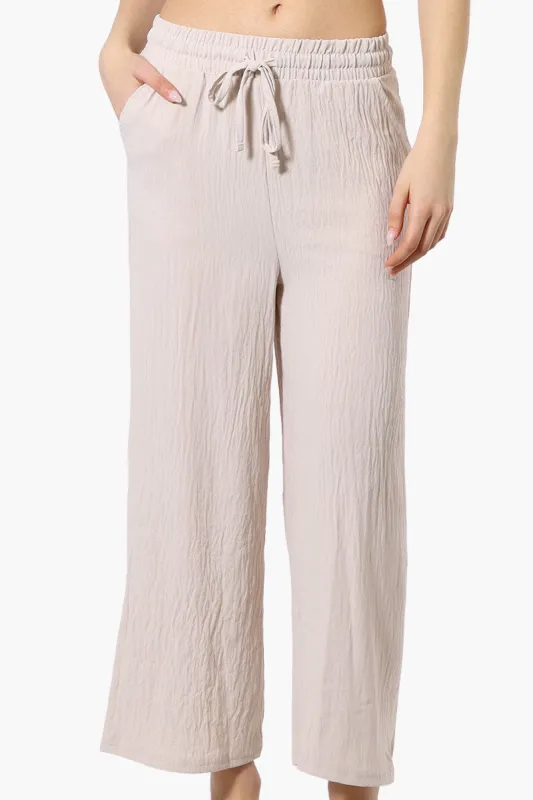 Urbanology Tie Waist Culotte Pants - Beige sold by Fairweather