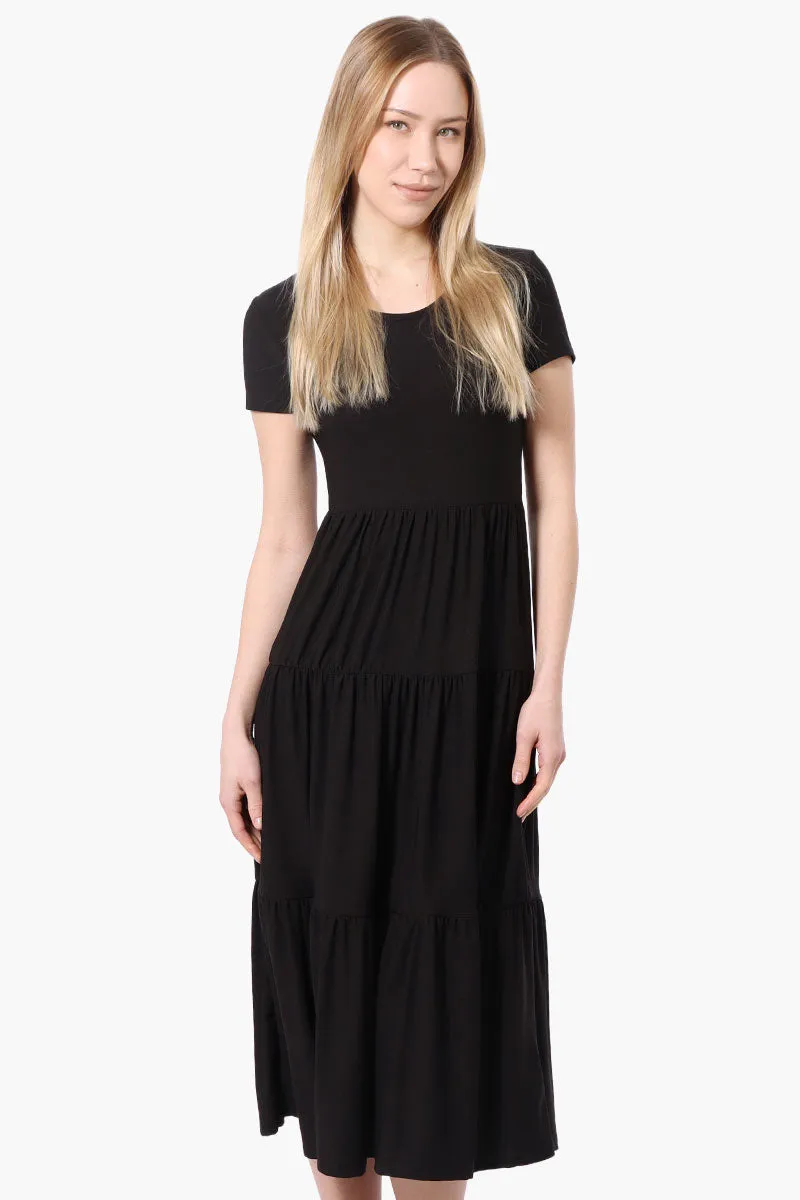 Costa Blanca Short Sleeve Tiered Maxi Dress - Black sold by Fairweather