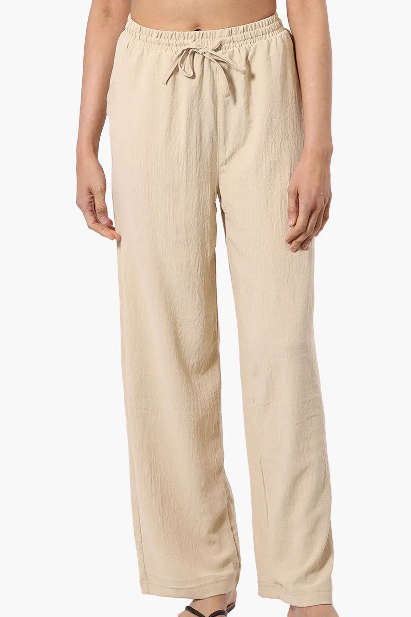 Stylexchange Vintage Solid Tie Waist Palazzo Pants - Cream sold by Fairweather