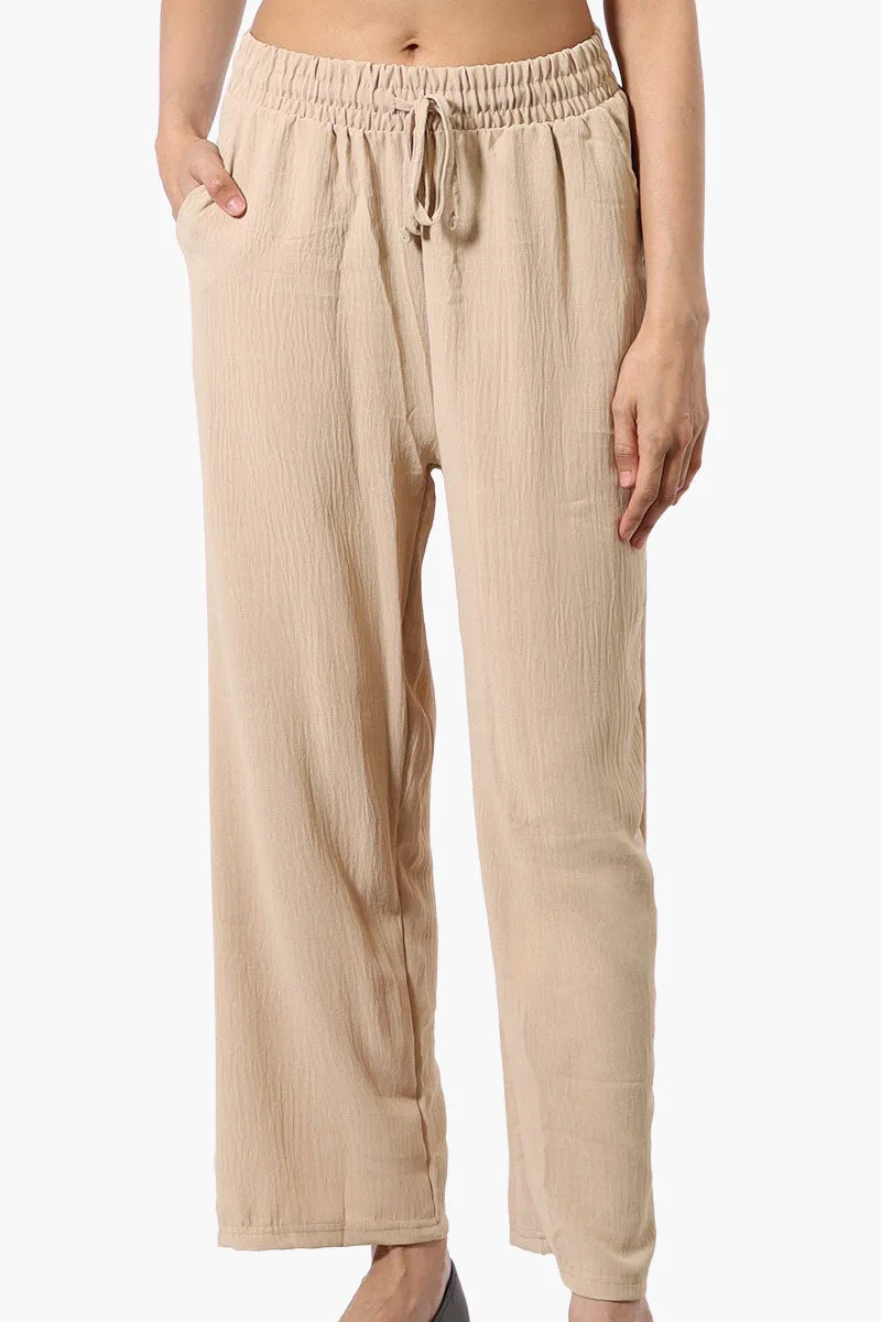 Stylexchange Tie Waist Wide Leg Crinkled Pants - Beige sold by Fairweather