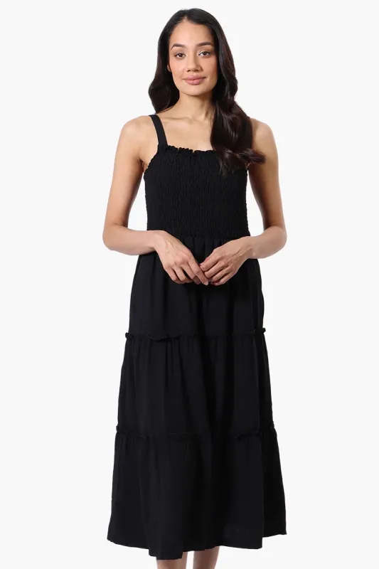 Urbanology Smocked Tiered Maxi Dress - Black sold by Fairweather