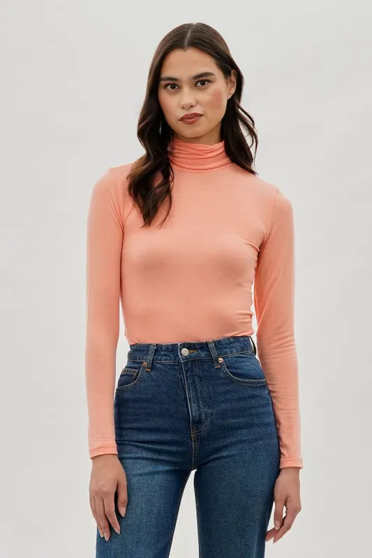 Magazine Cinched Side Turtleneck Long Sleeve Top - Pink sold by Fairweather