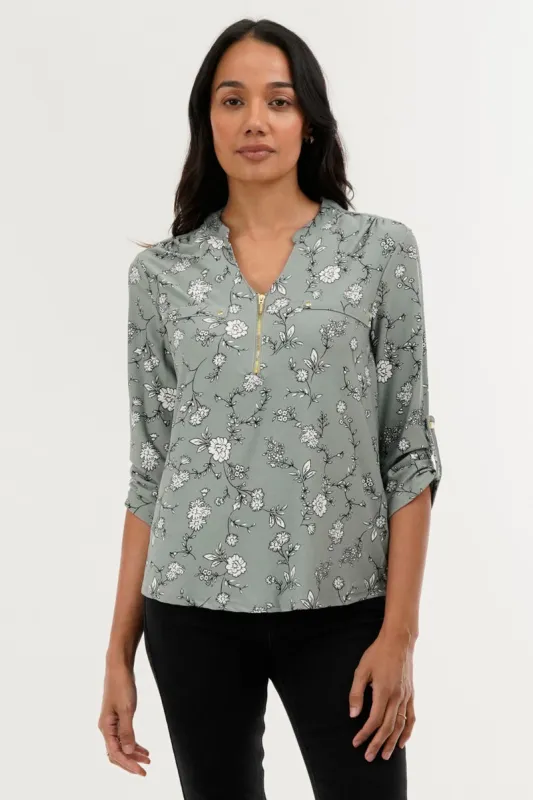 International INC Company Floral 1/4 Zip Blouse - Green sold by Fairweather
