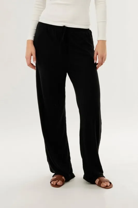 International INC Company Wide Leg Knit Sweatpants - Black sold by Fairweather