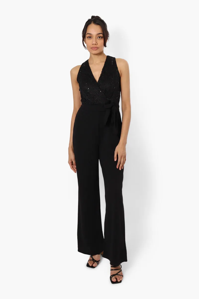 Limite Belted Lace Sequin Jumpsuit - Black sold by Fairweather