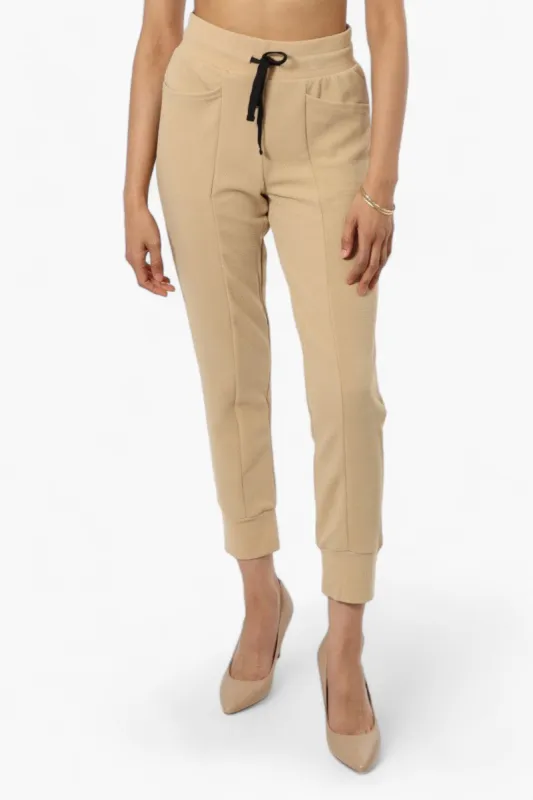 Impress Tie Waist Jogger Pants - Beige sold by Fairweather