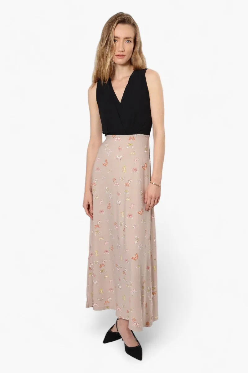 Limite Butterfly Sleeveless Crossover Maxi Dress - Beige sold by Fairweather