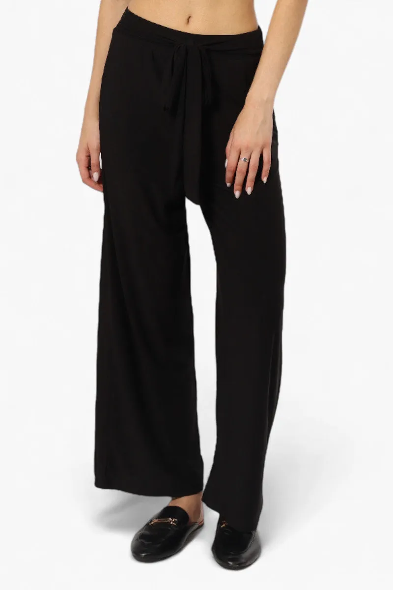 International INC Company Solid Belted Palazzo Pants - Black sold by Fairweather