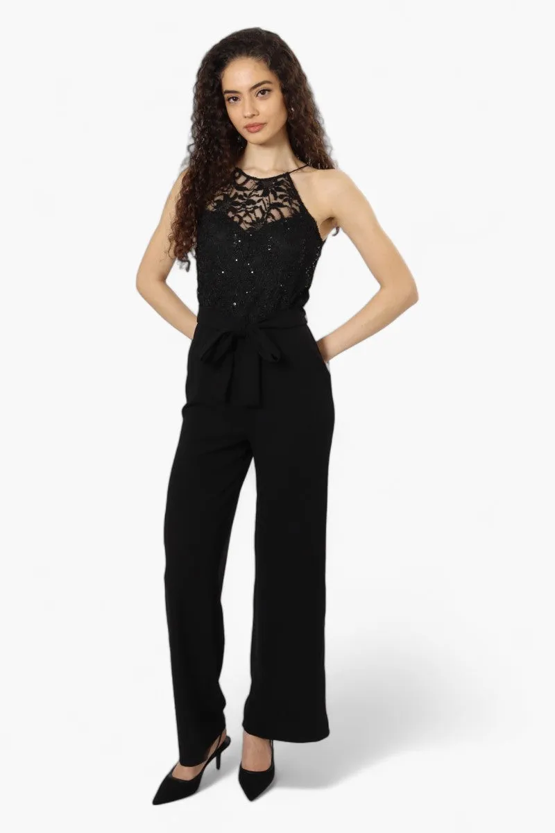 Limite Belted Lace Sequin Jumpsuit - Black sold by Fairweather