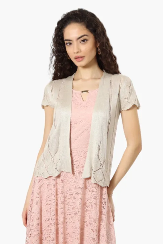 Impress Knit Cap Sleeve Shrug Cardigan - Beige sold by Fairweather