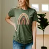 He First Loved (Rainbow) Tee sold by Faithful and Co.