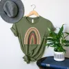 He First Loved (Rainbow) Tee sold by Faithful and Co.