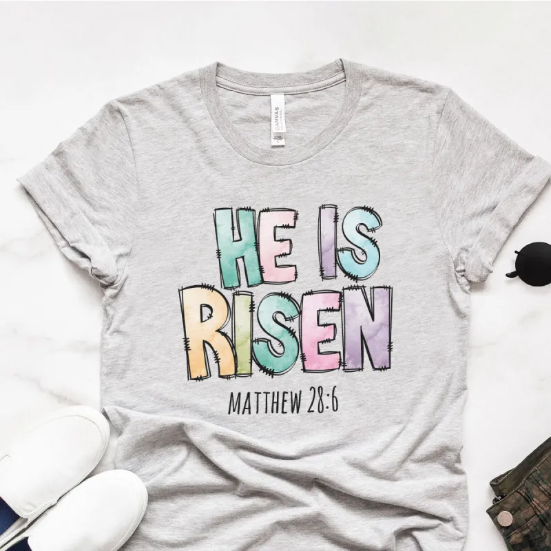 He Is Risen Easter Patchwork Tee sold by Faithful and Co.