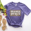 This Mama Prays Tee sold by Faithful and Co.