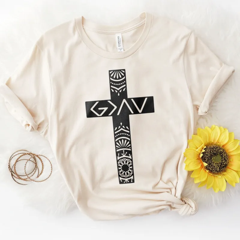 God Is Greater Cross Tee sold by Faithful and Co.
