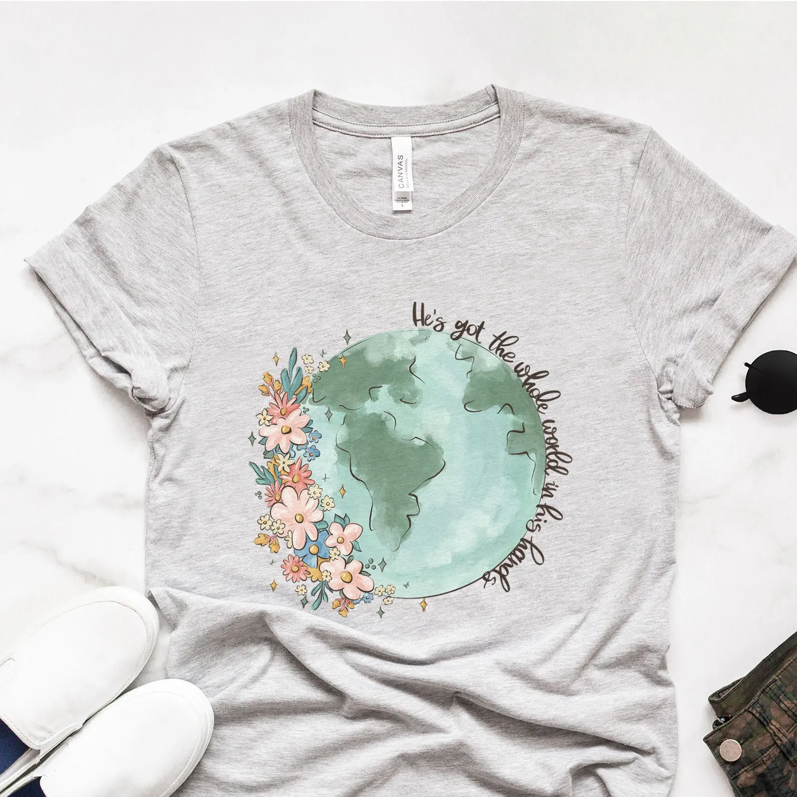 He's got the whole world in His hands Tee sold by Faithful and Co.