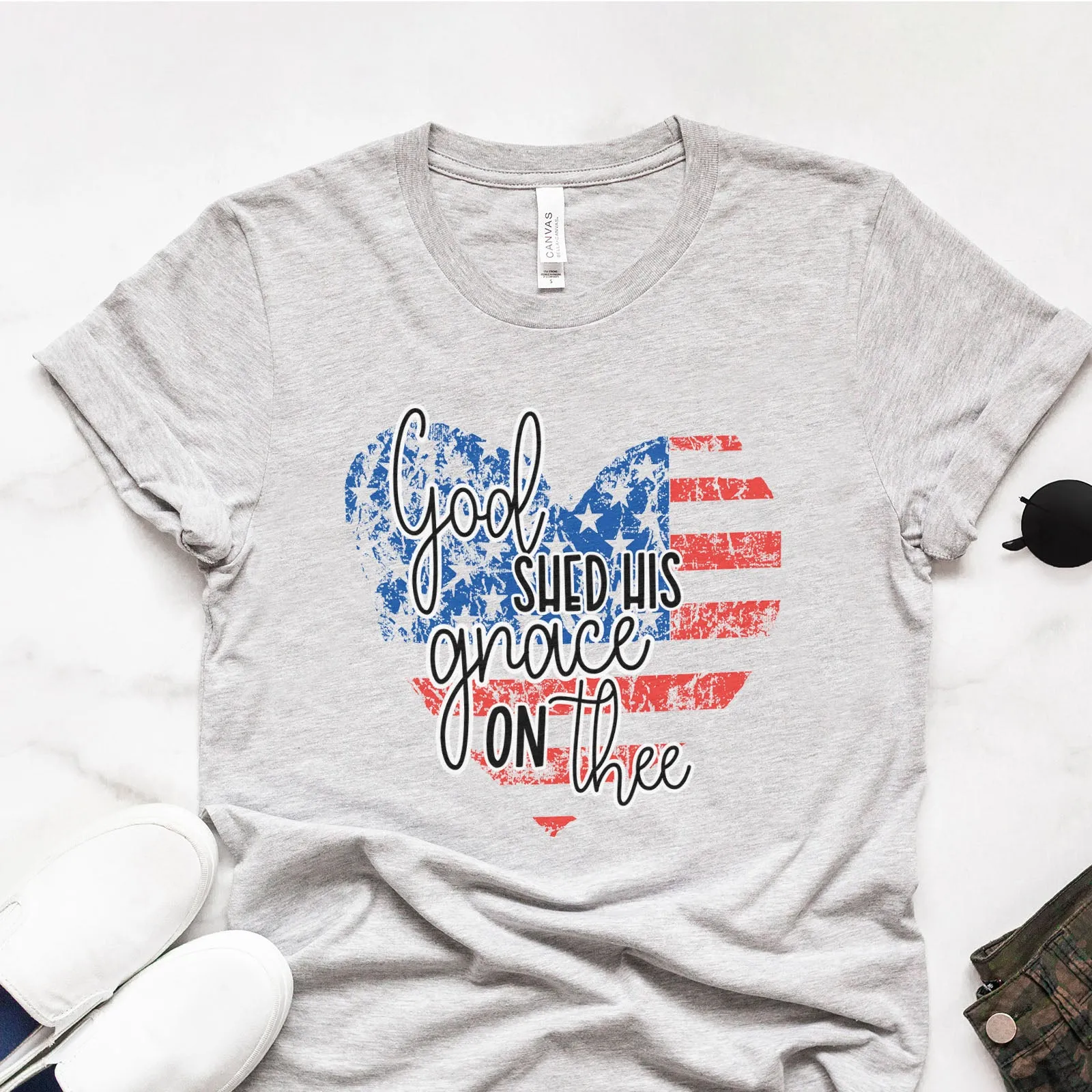 God Shed His Grace USA Heart Tee sold by Faithful and Co.