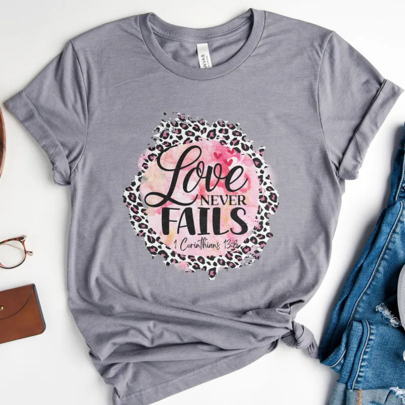 Love Never Fails Pink Leopard 1 Corinthians 13:8 Tee sold by Faithful and Co.