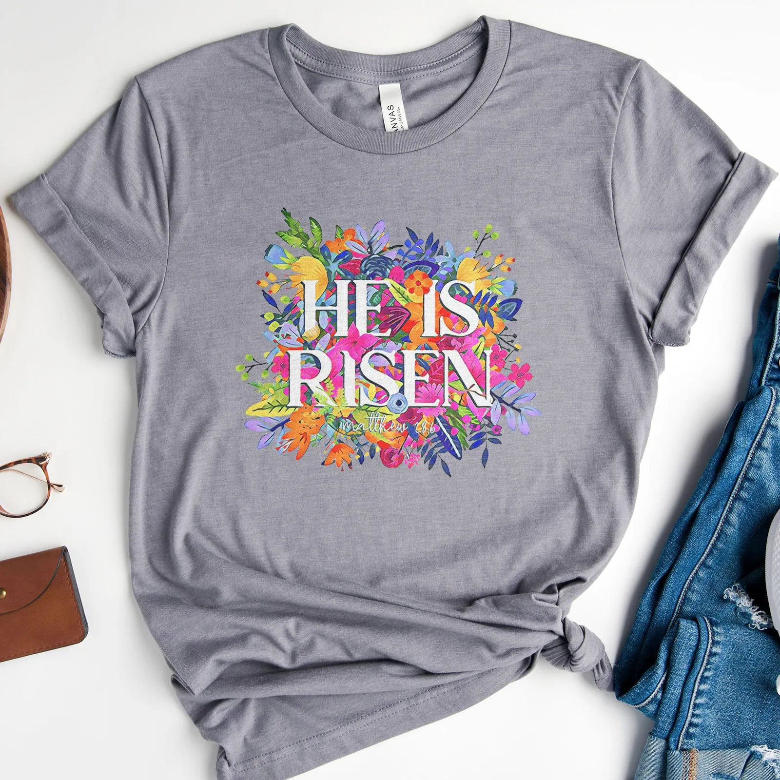 He Is Risen Bright Easter Flowers Tee sold by Faithful and Co.