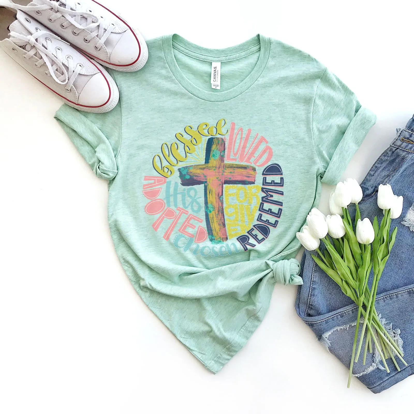 Redeemed Cross Tee sold by Faithful and Co.