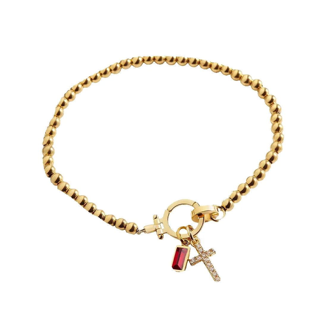 Birthstone Cross Charm Bracelet sold by Faithful and Co.