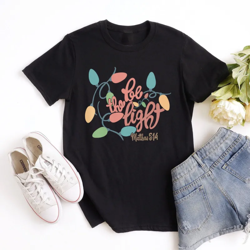 Be The Light Christmas Lights Tee sold by Faithful and Co.