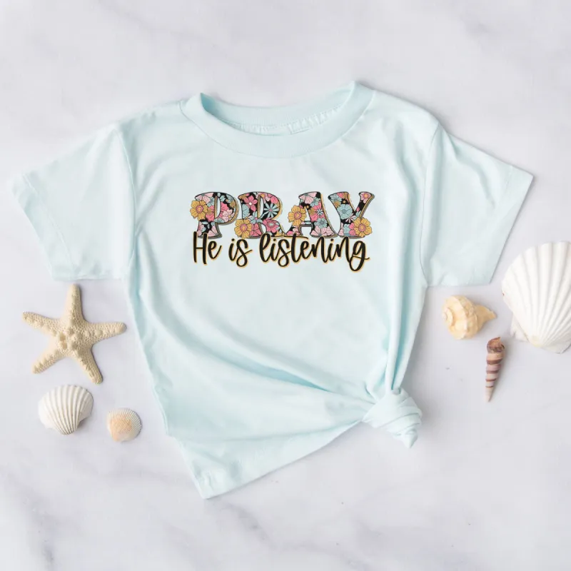 Spring Flowers Pray, He Is Listening Tee sold by Faithful and Co.