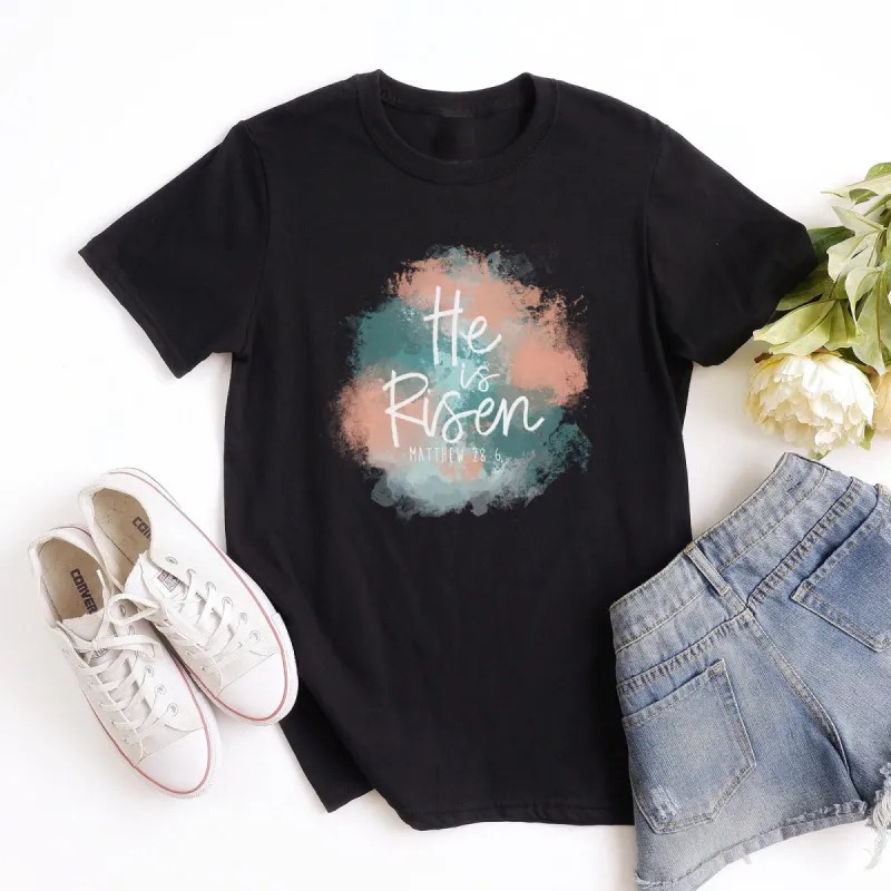 He is Risen Matthew 28:6 Watercolor Tee sold by Faithful and Co.