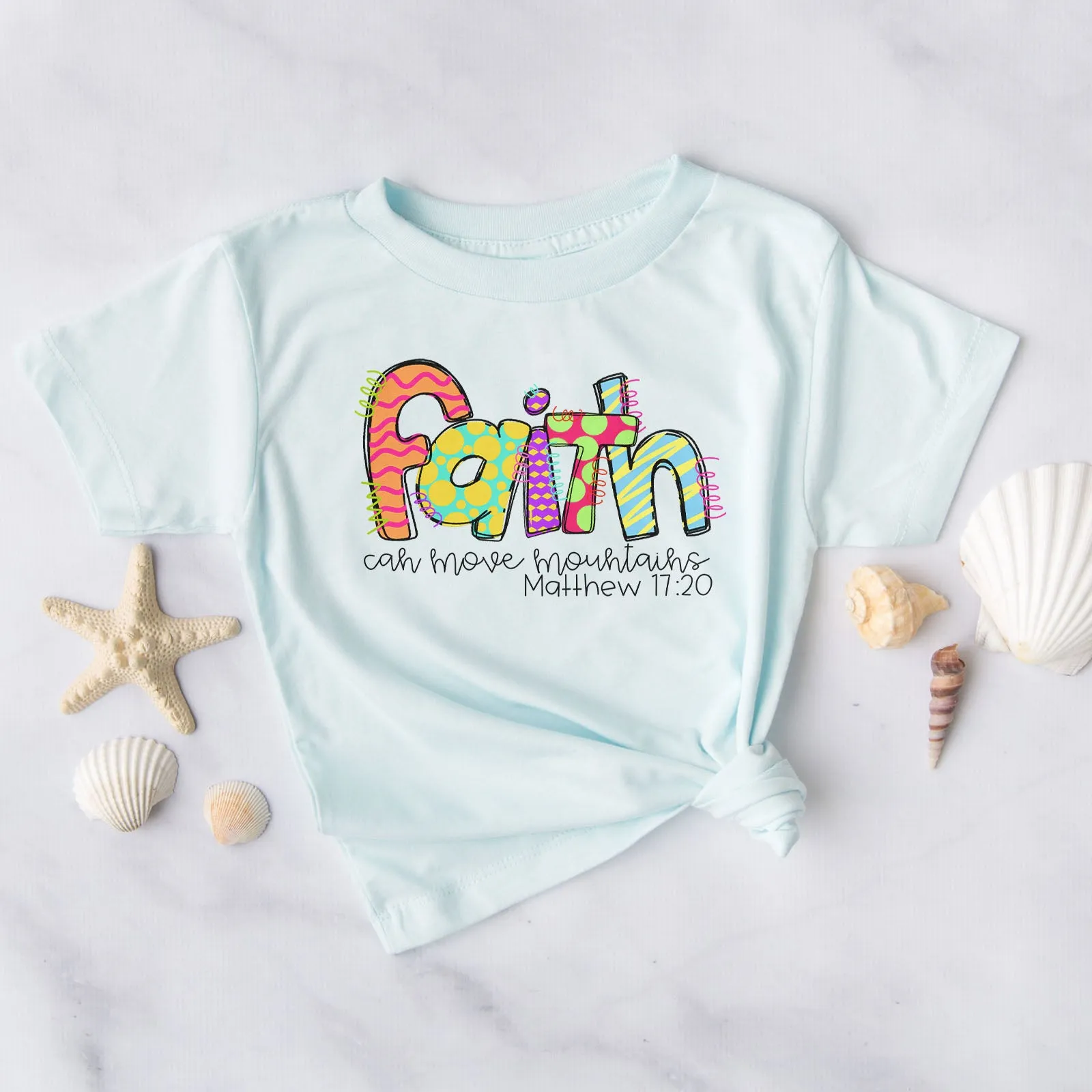 Faith Moves Mountains Leopard Tee sold by Faithful and Co.