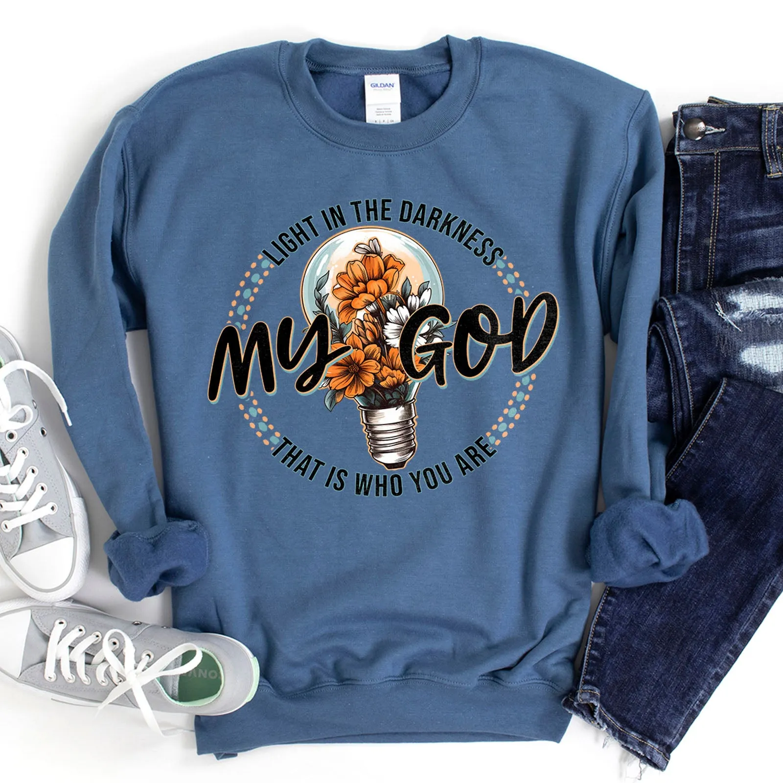 Light in the Darkness Floral Light Bulb Sweatshirt sold by Faithful and Co.