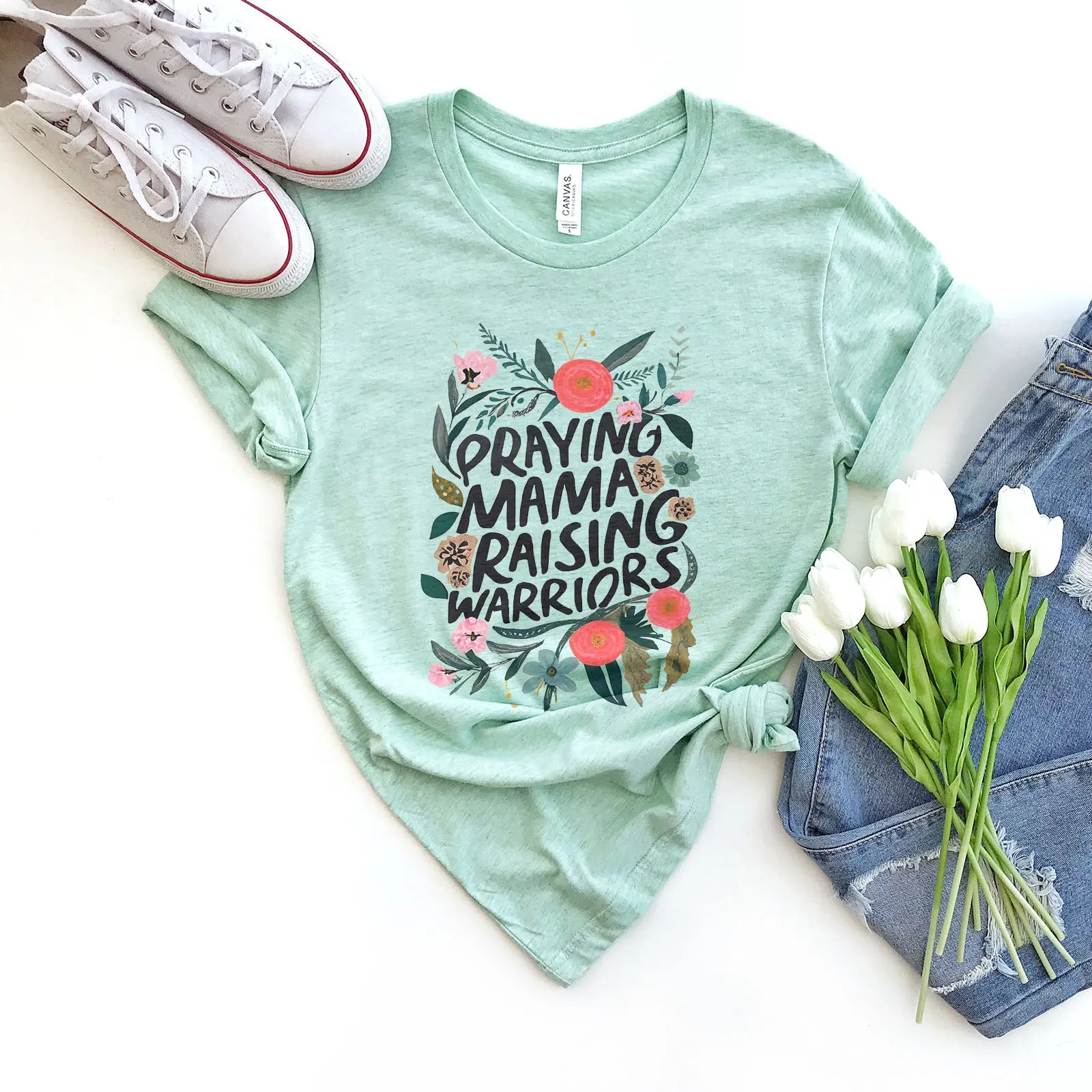 Praying Mamas Raising Warriors Floral Tee sold by Faithful and Co.