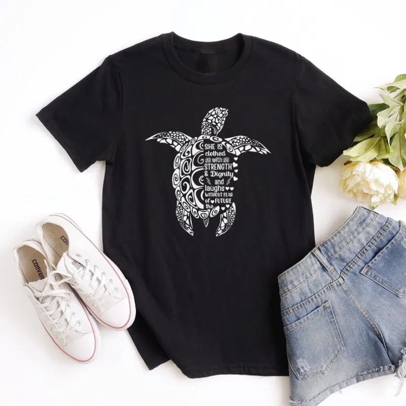 She is Clothed in Strength And Dignity Sea Turtle White Tee made by Faithful and Co.